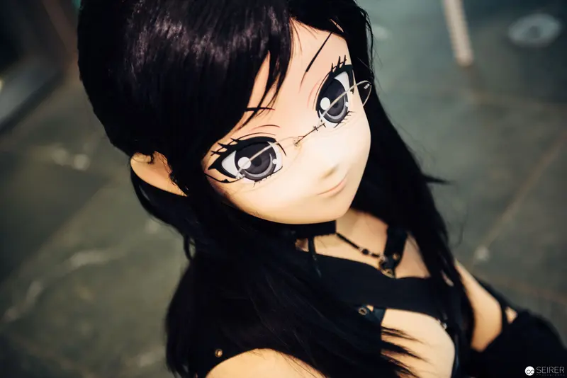 Anime-Style Doll with Large Expressive Eyes in Monochrome Portrait