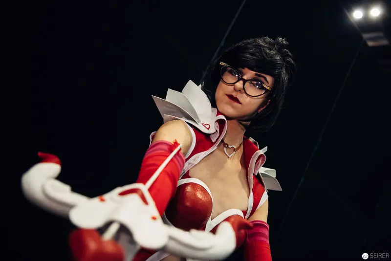 Cosplay Portrait of Anime Character in Red and White Costume with Glasses