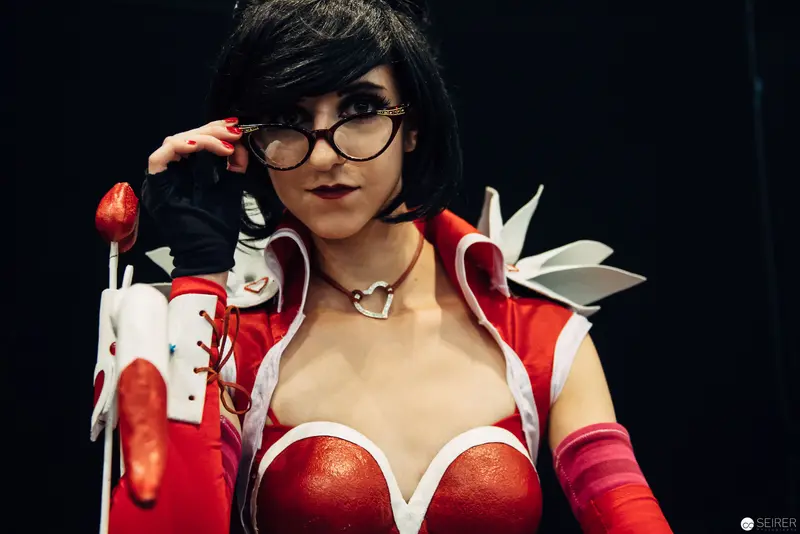 Cosplay Portrait of Woman in Red and White Costume with Glasses