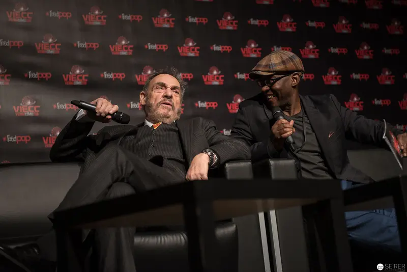 Two Microphone Performers at VIECC Entertainment Conference Panel Discussion