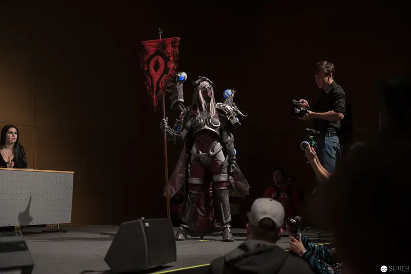 Cosplay Performance with Detailed Character Costume on Staged Event Platform