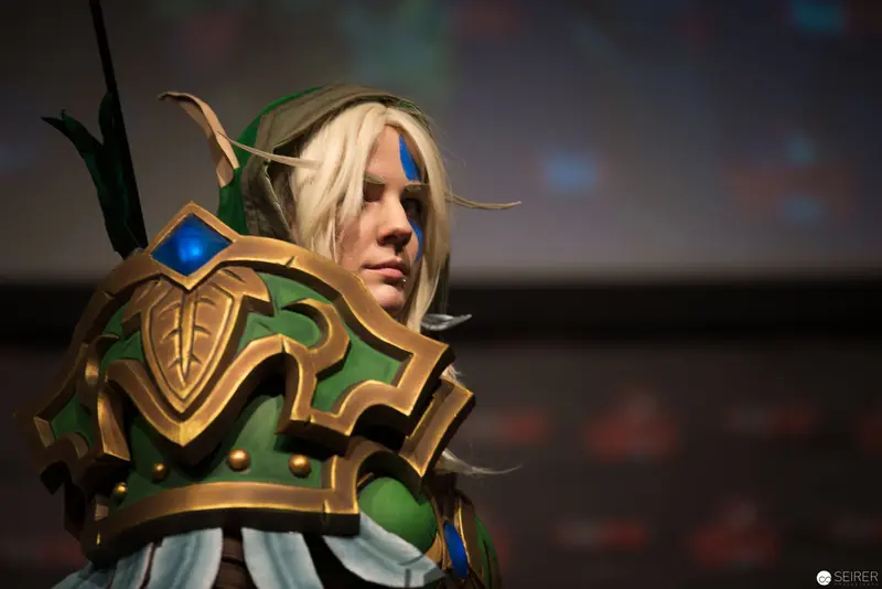Cosplay Portrait of High Elf Warrior in Ornate Gold and Green Armor