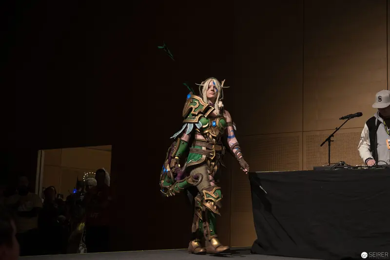 World of Warcraft Cosplay Performance at Convention Stage with DJ Booth