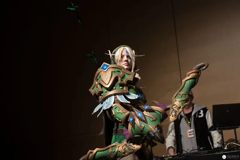 Cosplay Performance of Elven Warrior in Elaborate Ornate Green Armor Costume