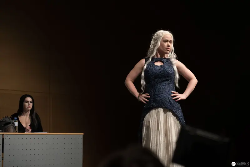 Television Performance Scene with Woman in Dark Blue Lace Dress
