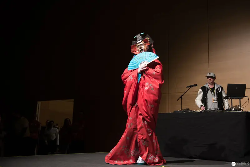 Performance of Traditional Japanese Dance with DJ at Cultural Event