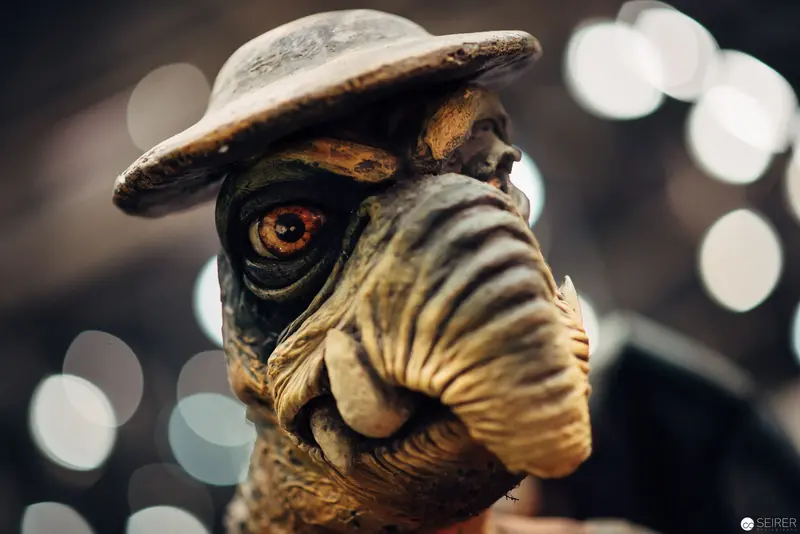 Alien Creature in Textured Mask with Distressed Leather Hat
