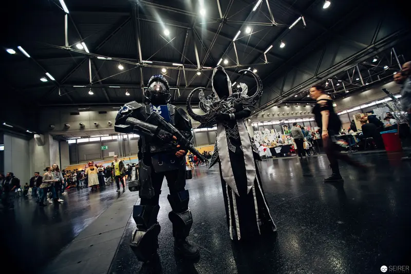 Cosplayers in Futuristic Combat Armor at Convention Hall
