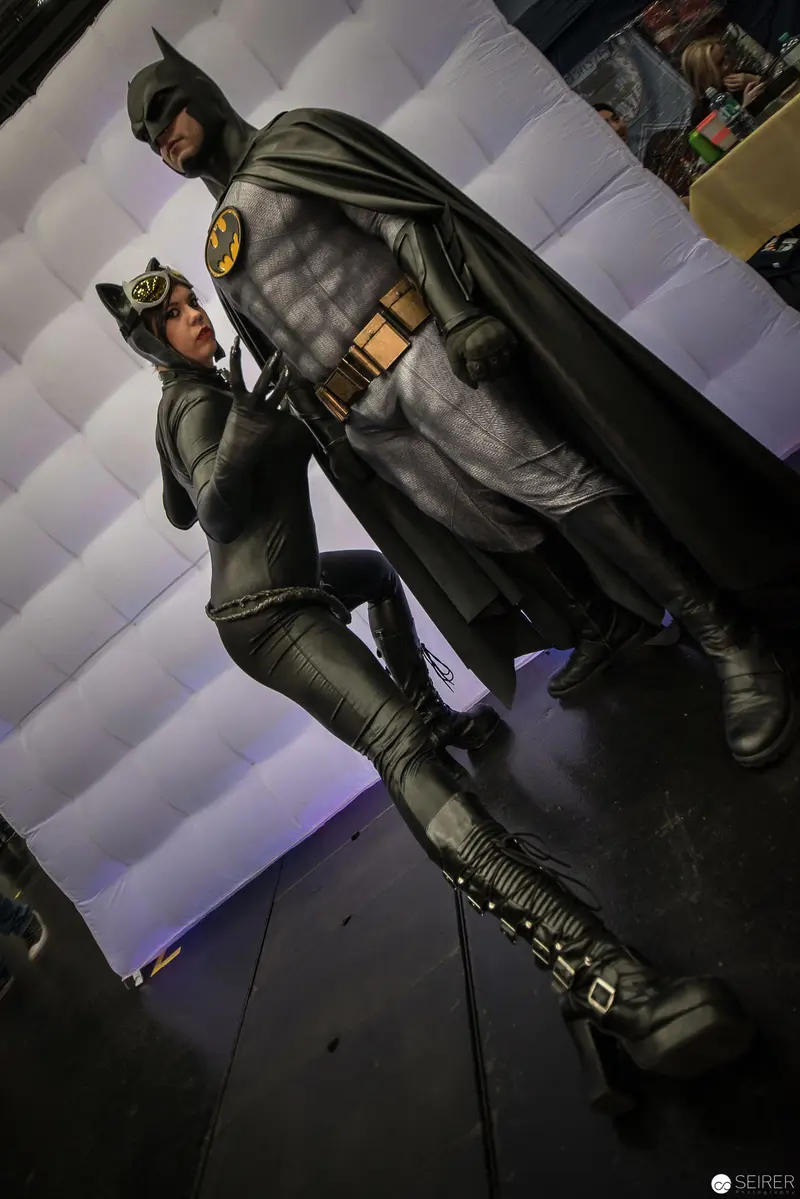 Batman and Catwoman Cosplay Figures in Dynamic Posed Encounter