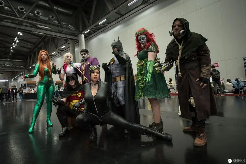 Comic Con Group Cosplay Featuring DC Universe Characters in Posed Ensemble