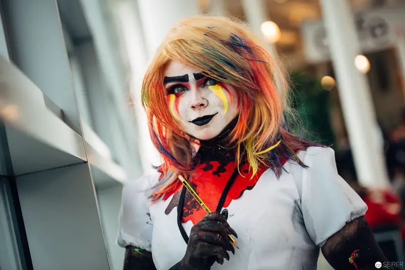 Cosplay Portrait with Dramatic Makeup and Theatrical Costume Design