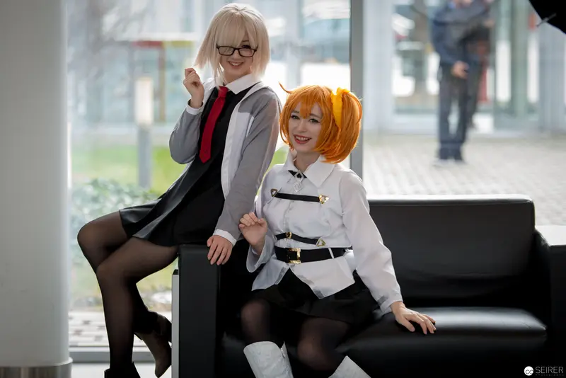 Cosplay Companions: Two Performers in Stylized Urban Interior Setting