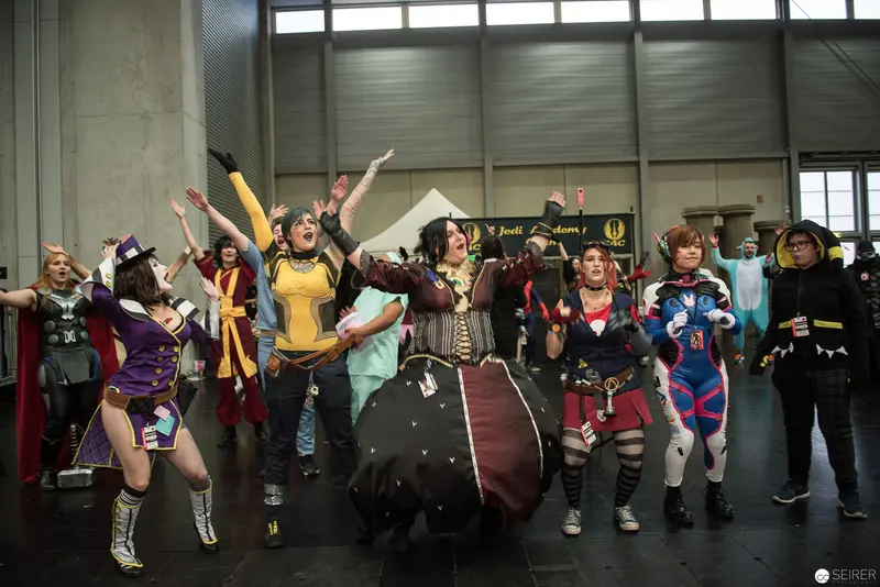 Cosplay Group Pose at Comic or Gaming Convention Showcasing Vibrant Character Costumes