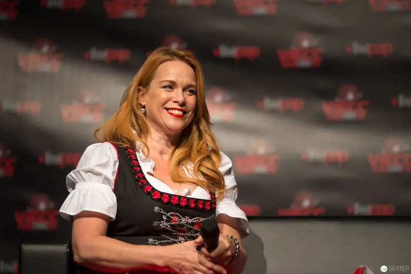 Female Speaker at Press Event in Traditional Bavarian Costume