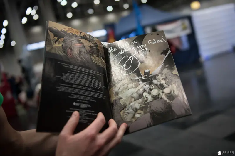 Open Book Revealing Graphic Art at Convention Display