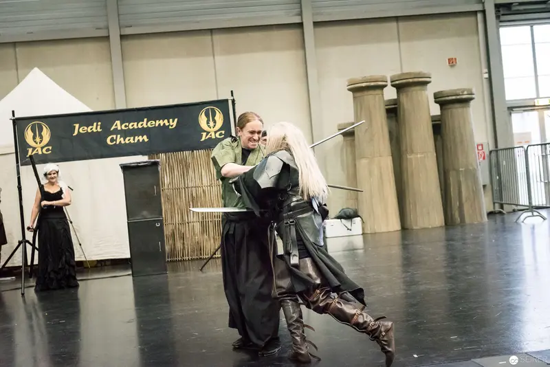 Jedi Academy Cham Performance: Fencers in Dynamic Staged Combat Interaction