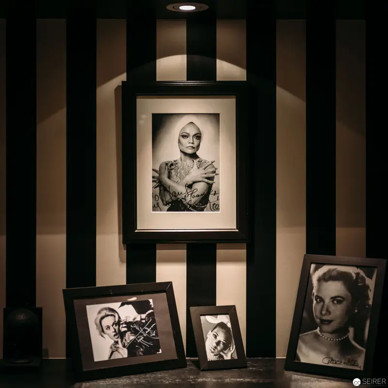 Vintage Portrait Collection with Dramatic Black and White Framed Photographs