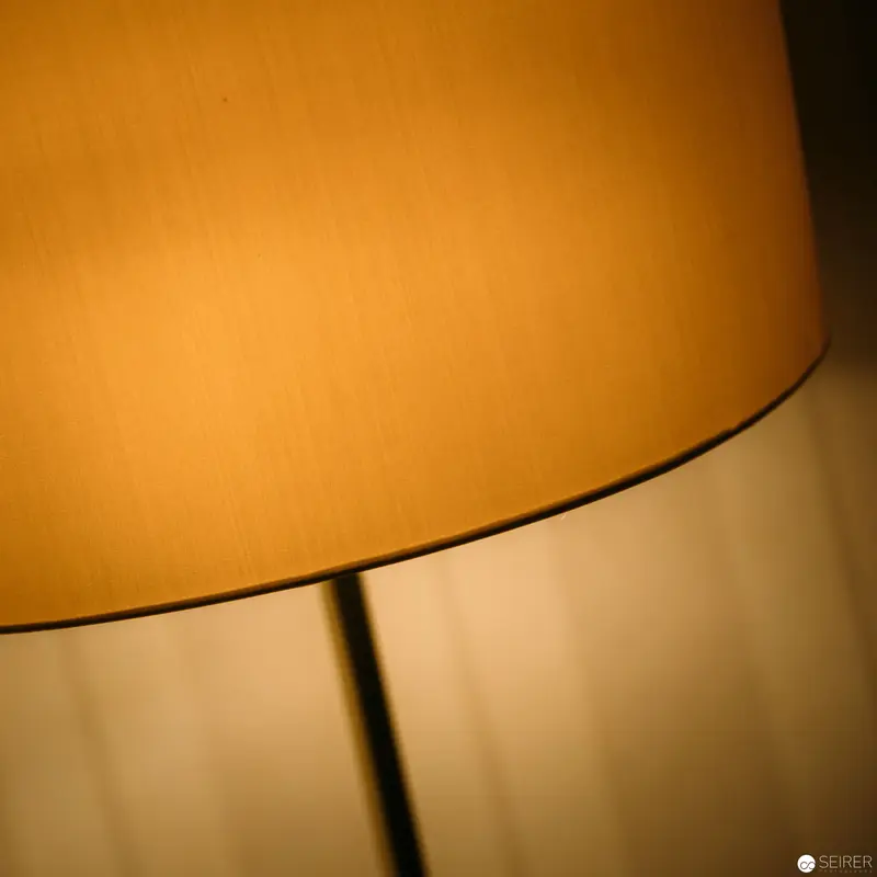 Intimate Geometric Abstraction of Lamp Shade in Warm Ochre Tones