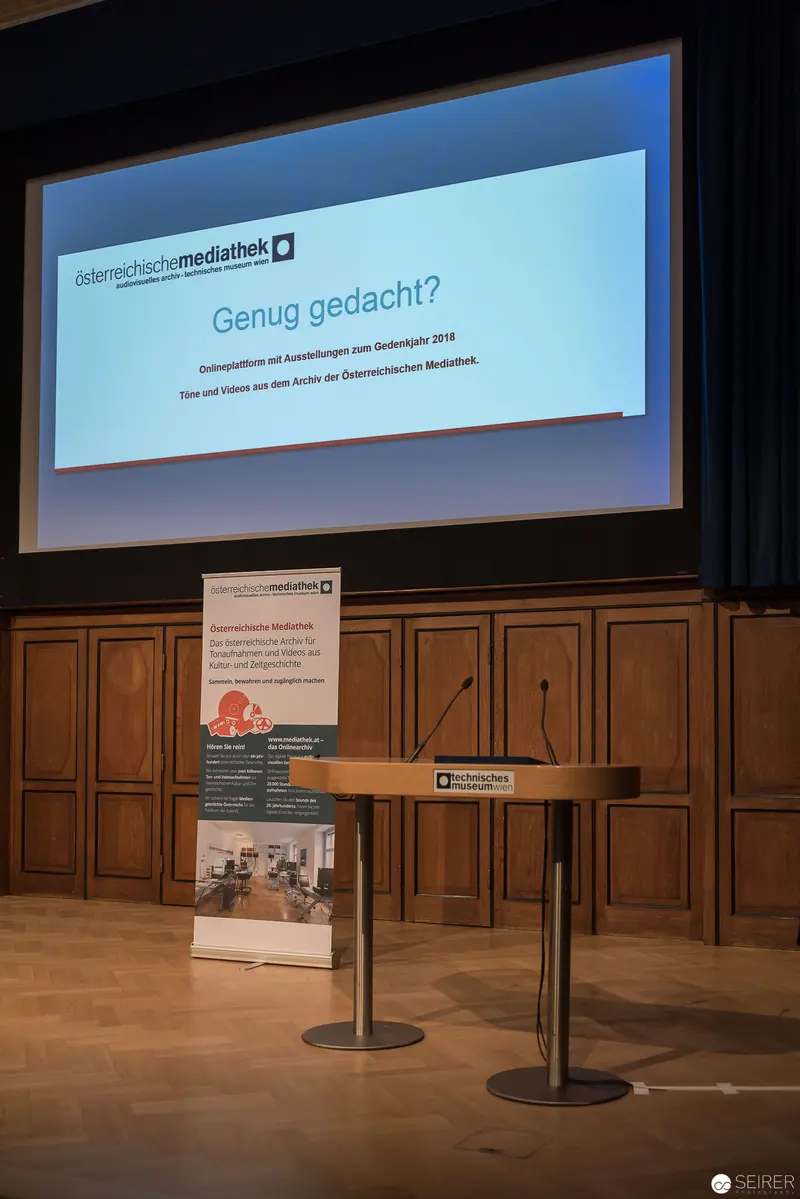 Presentation Stage at Information Mediation Event with Projection Screen