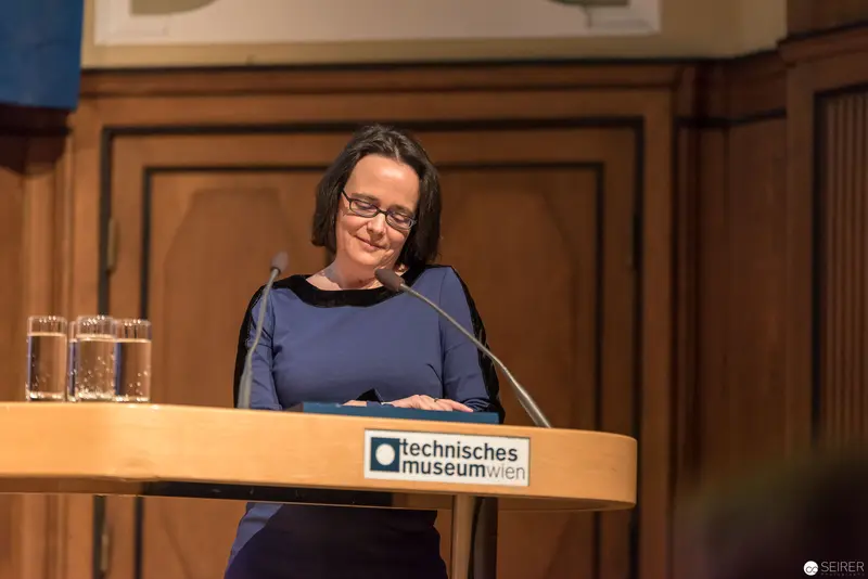 Lecturer at Technisches Museum Wien Speaking Podium in Blue Dress