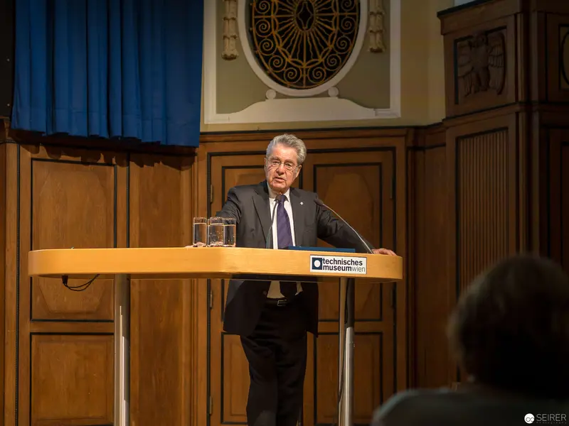 Scholarly Figure Delivering Lecture at Technisches Museum Vienna