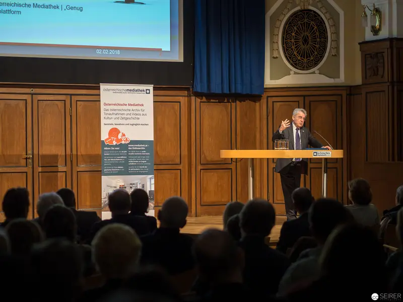 Lecture at Austrian Media Conference with Speaker at Podium, Audience Background