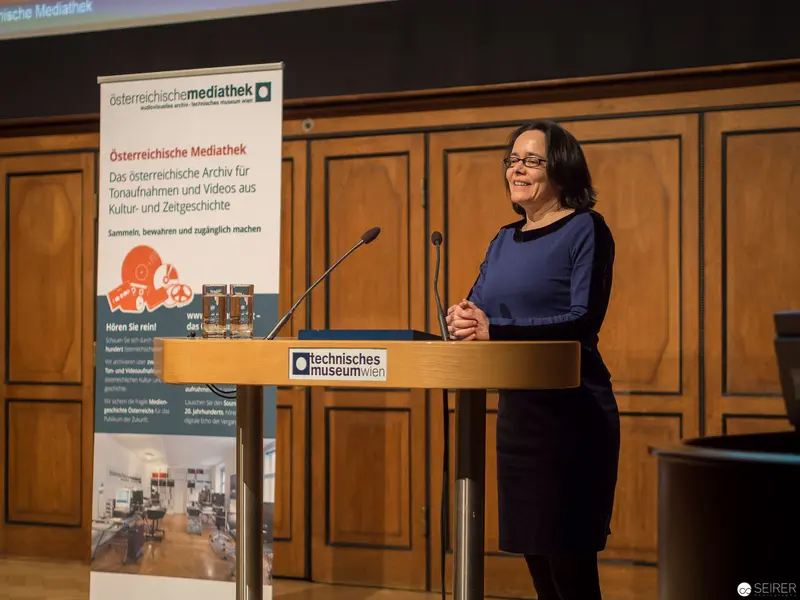 Austrian Mediathek Presenter Lecturing at Technical Museum Podium