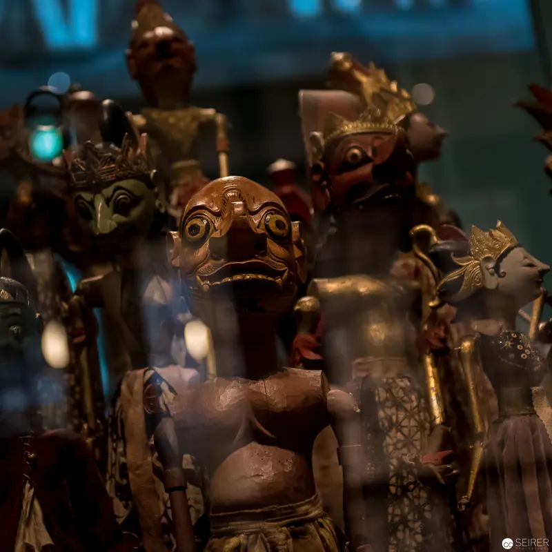 Ritualistic Bronze Figurines Assembled in Mystical Atmospheric Tableau