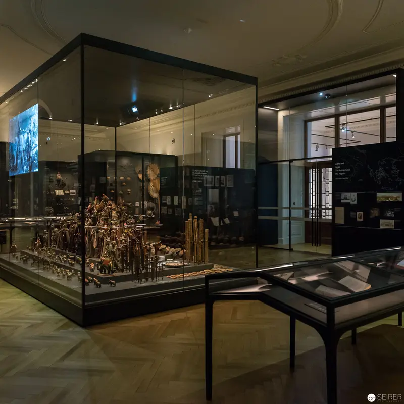 Museum Vitrine Displaying Complex Historical Bronze Sculptural Artifact