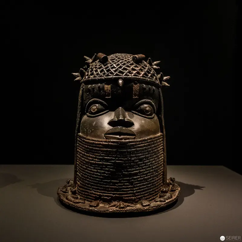 Benin Bronze Commemorative Head with Intricate Netted Headdress and Ridged Neck