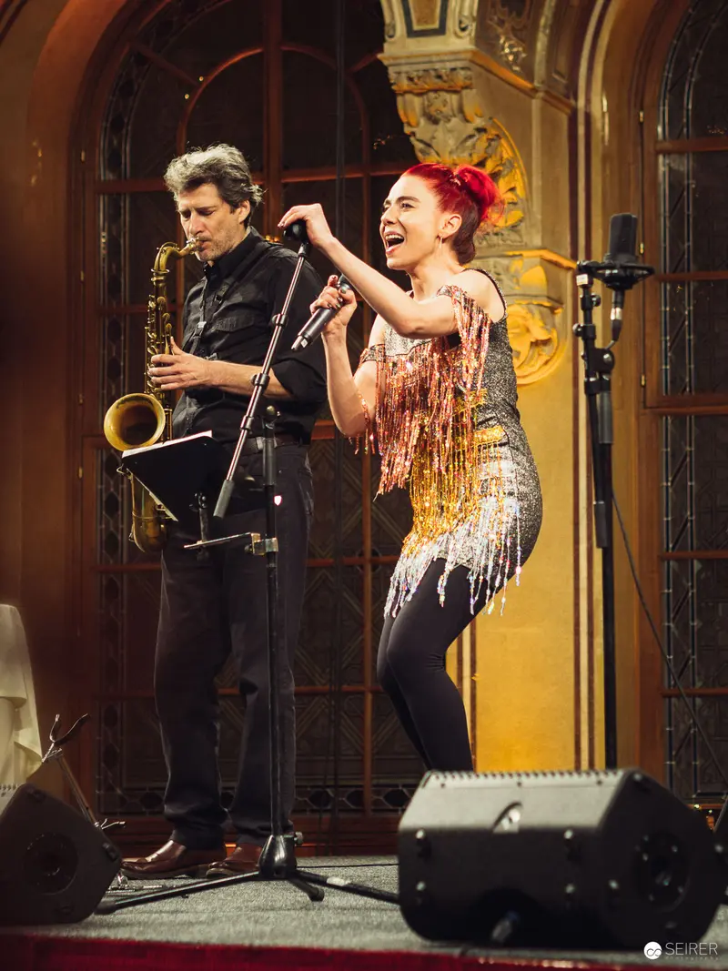 Jazz Performance with Saxophonist and Dynamic Vocalist in Ornate Venue
