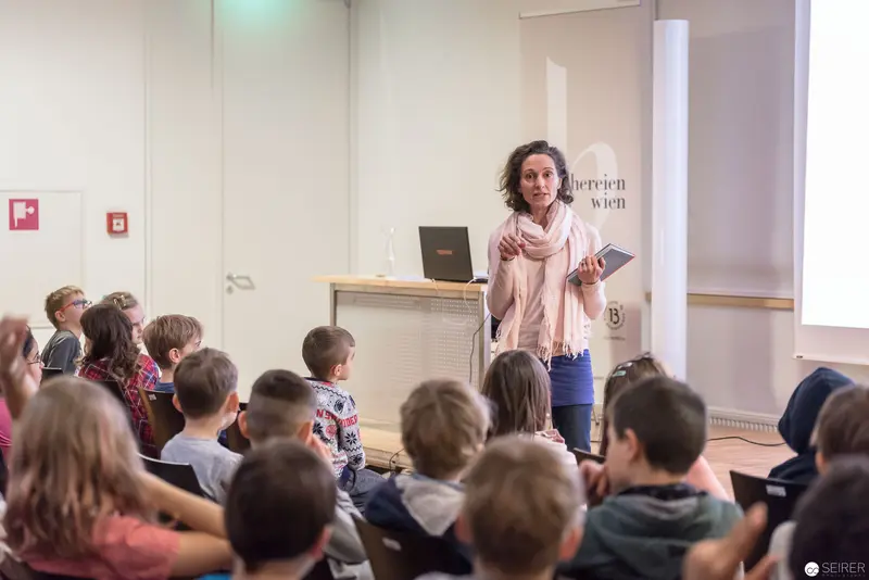 Melanie Laibl Conducting Children's Book Reading at Bücherei Wien