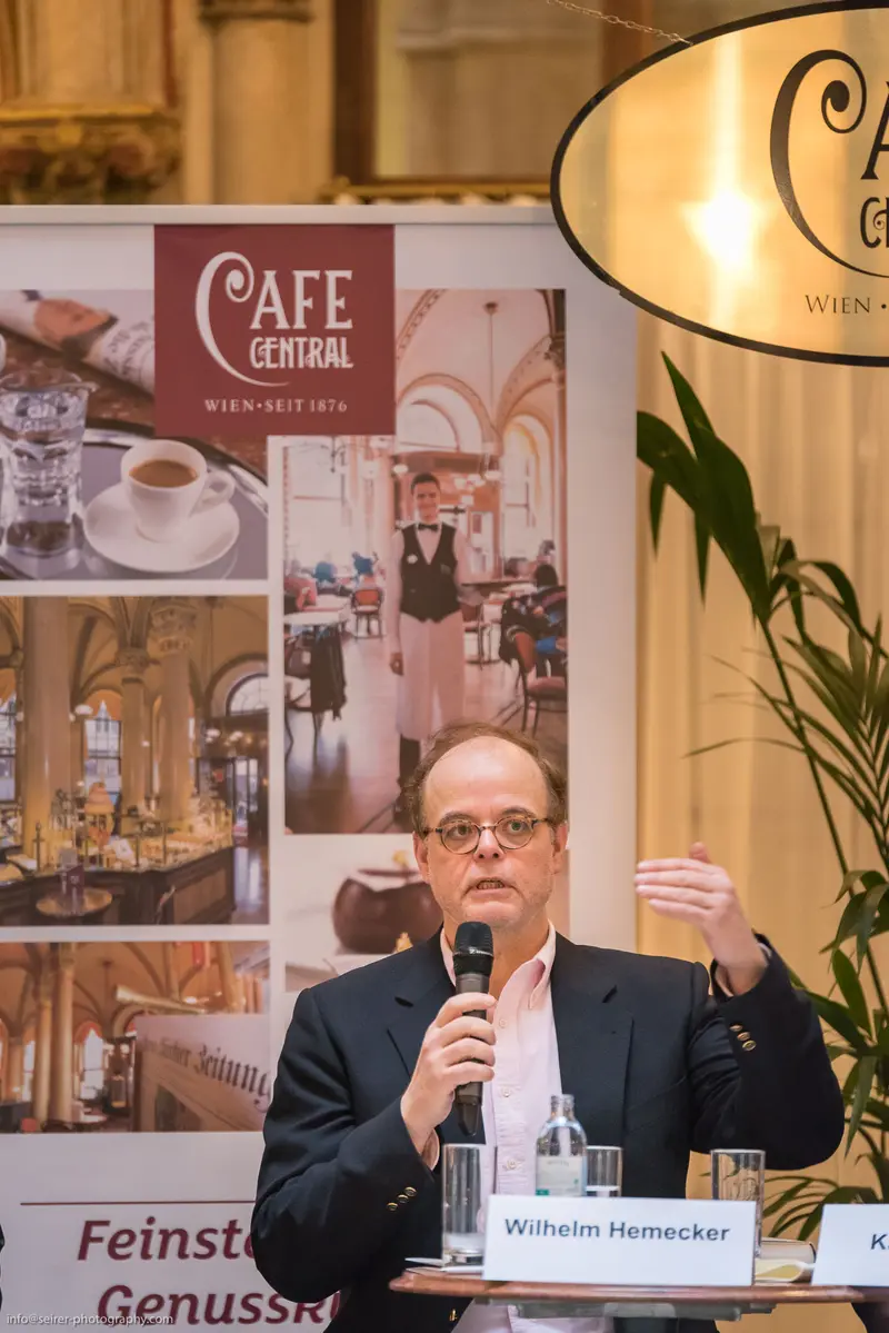 Wilhelm Hernecker Speaking at Cafe Central Press Conference in Vienna