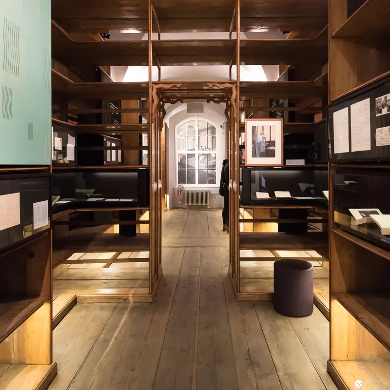 Wooden Interior Archival Space with Luminous Architectural Detailing