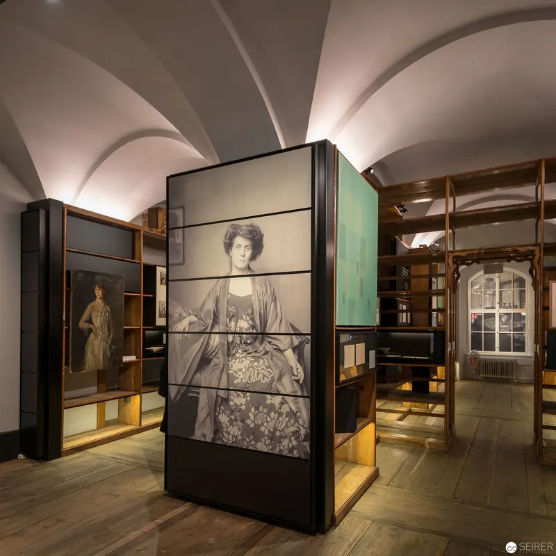 Museum Exhibition Display with Vintage Photographic Portrait Installation