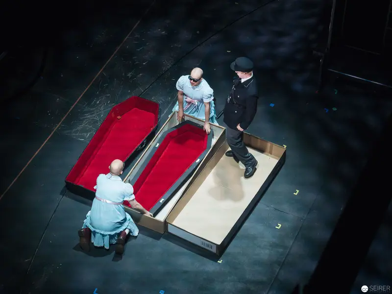 Theatrical Staging of Coffins in Dramatic Performance at Theater an der Wien