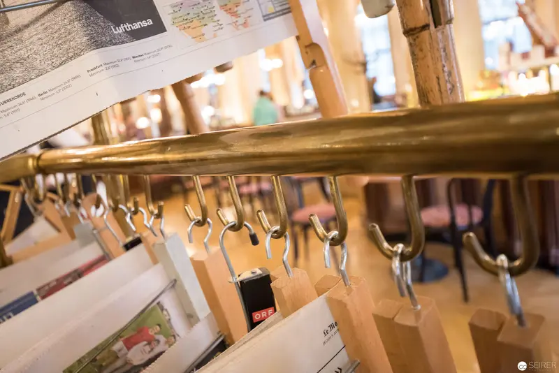 Lufthansa Newspaper Rack with Brass Hanging Rail in Cafe Central