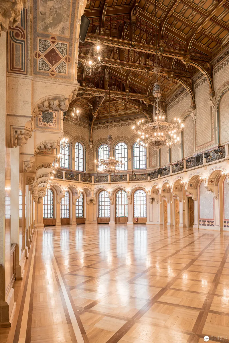 Grand Ceremonial Hall with Intricate Architecture and Elaborate Chandeliers