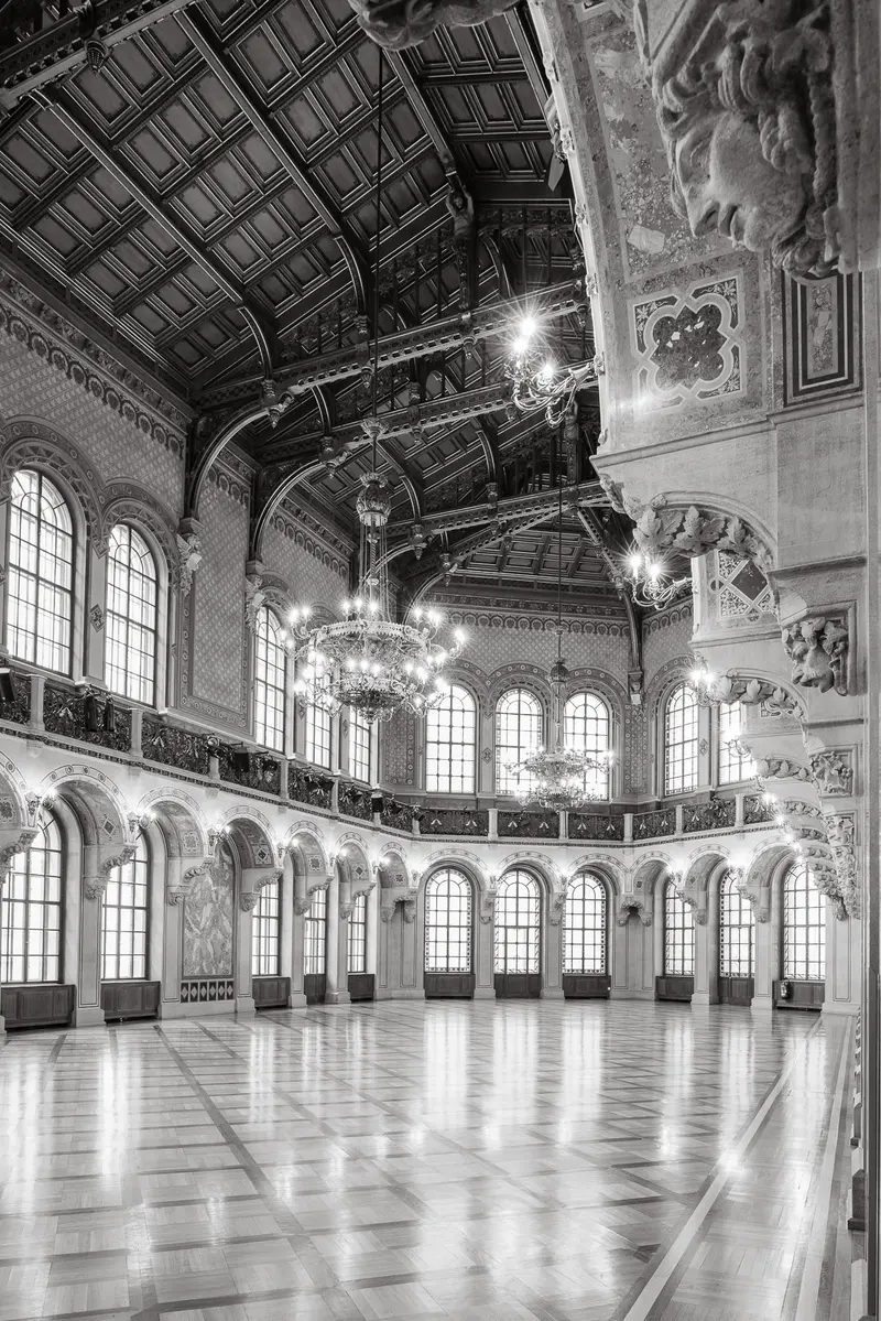 Grand Hall of Architectural Splendor: Ornate Baroque Interior with Chandelier Illumination