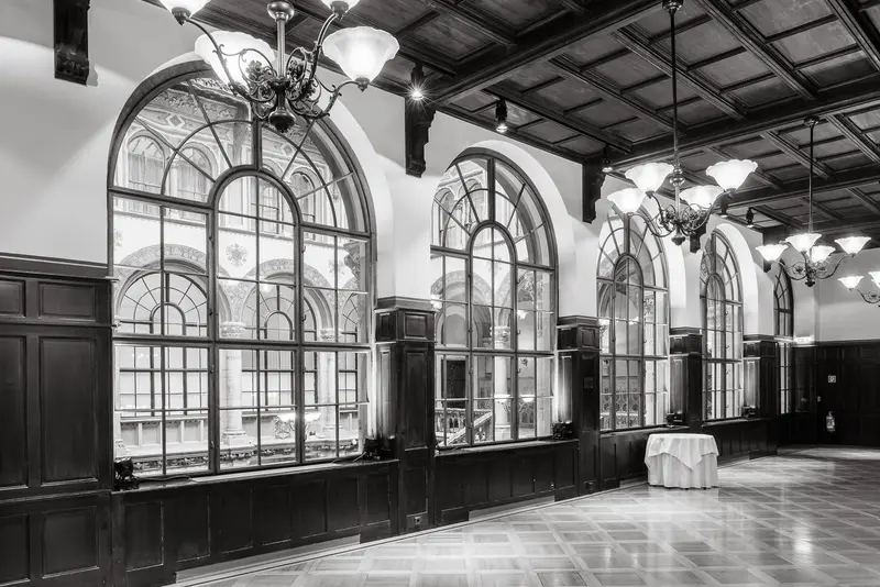 Café Central's Grand Interior: Architectural Panorama in Black and White