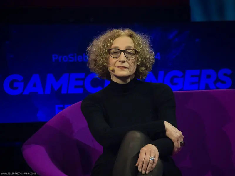 Speaker at ProSieben 4GameChangers Festival in Black Attire and Glasses