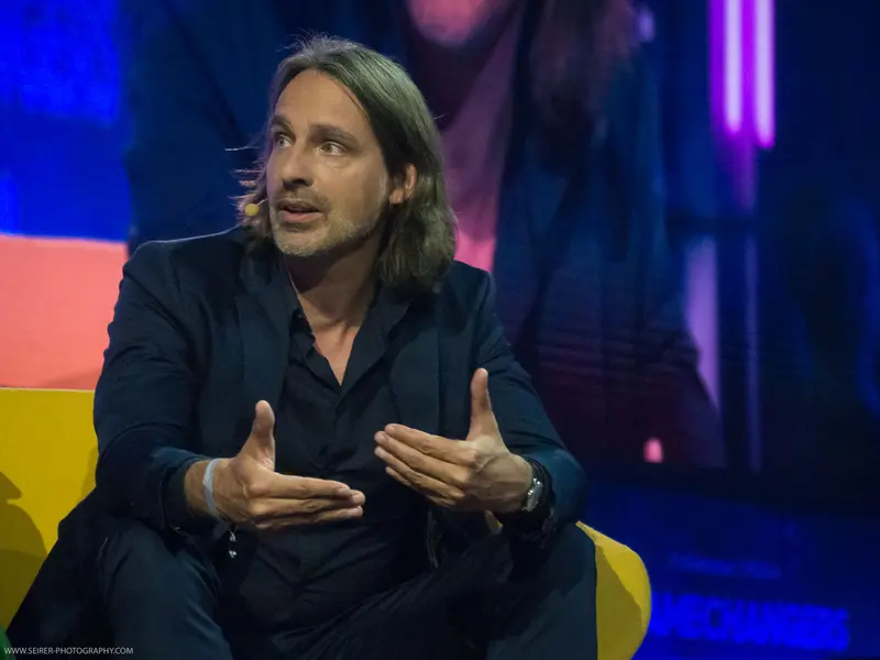 4GameChangers Festival Speaker Gesturing During Intense Panel Discussion
