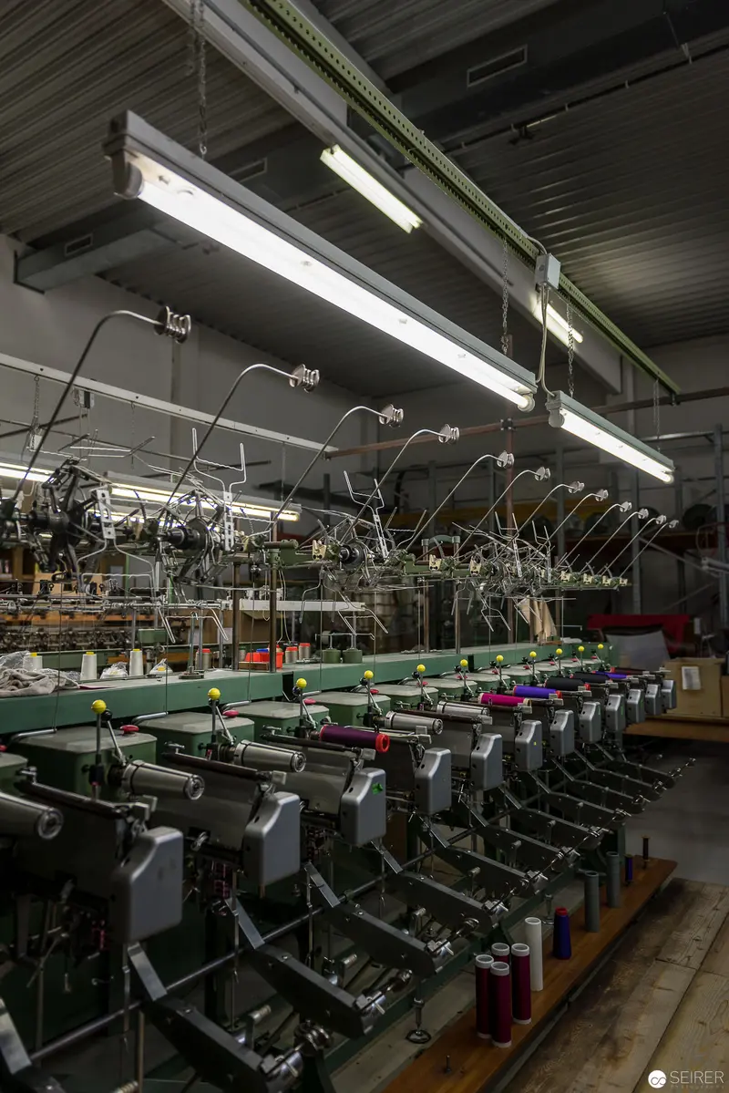 Industrial Textile Machinery Illuminated: Precision Manufacturing Interior