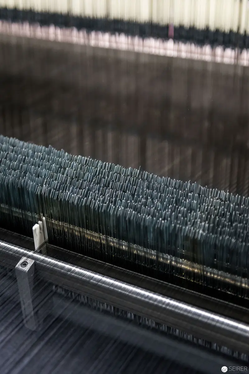 Intricate Industrial Textile Loom Mechanism with Dense Metallic Thread Array
