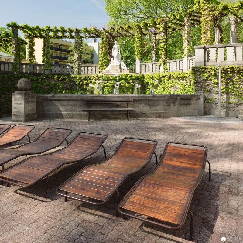 Thermal Spa Lounge with Wooden Sunbeds and Verdant Pergola at Bad Vöslau