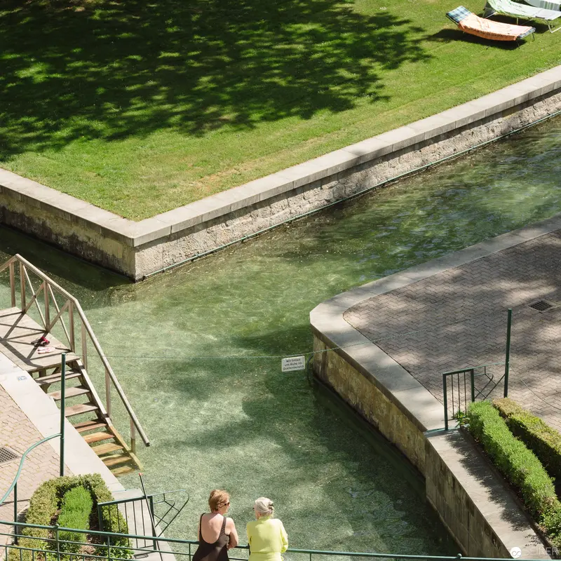 Thermal Bath Leisure at Bad Vöslau: Architectural Water Landscape with Visitors