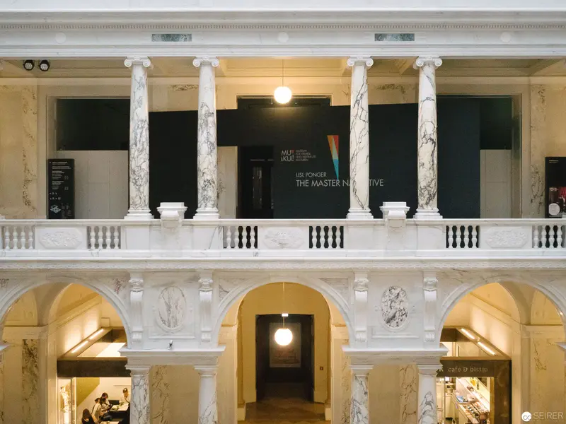 Classical Museum Interior with Marble Columns and Architectural Grandeur