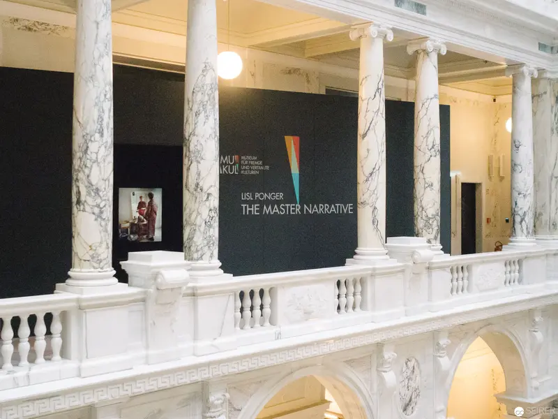 Exhibition Display of "The Master Narrative" at Museum with Marble Architecture