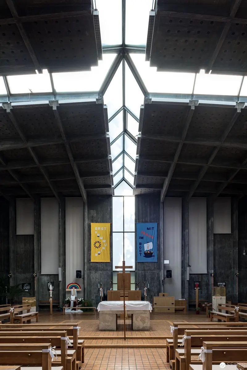 Interior of Modern Church with Vertical Skylight and Liturgical Banners in Oberbaumgarten, Vienna