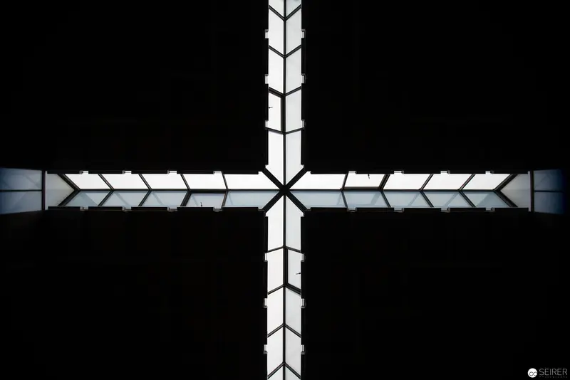 Symmetrical Architectural Cross in White and Gray Geometric Composition